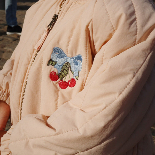 Juno Cherry Print Quilted Bomber Jacket (Cameo Rose)